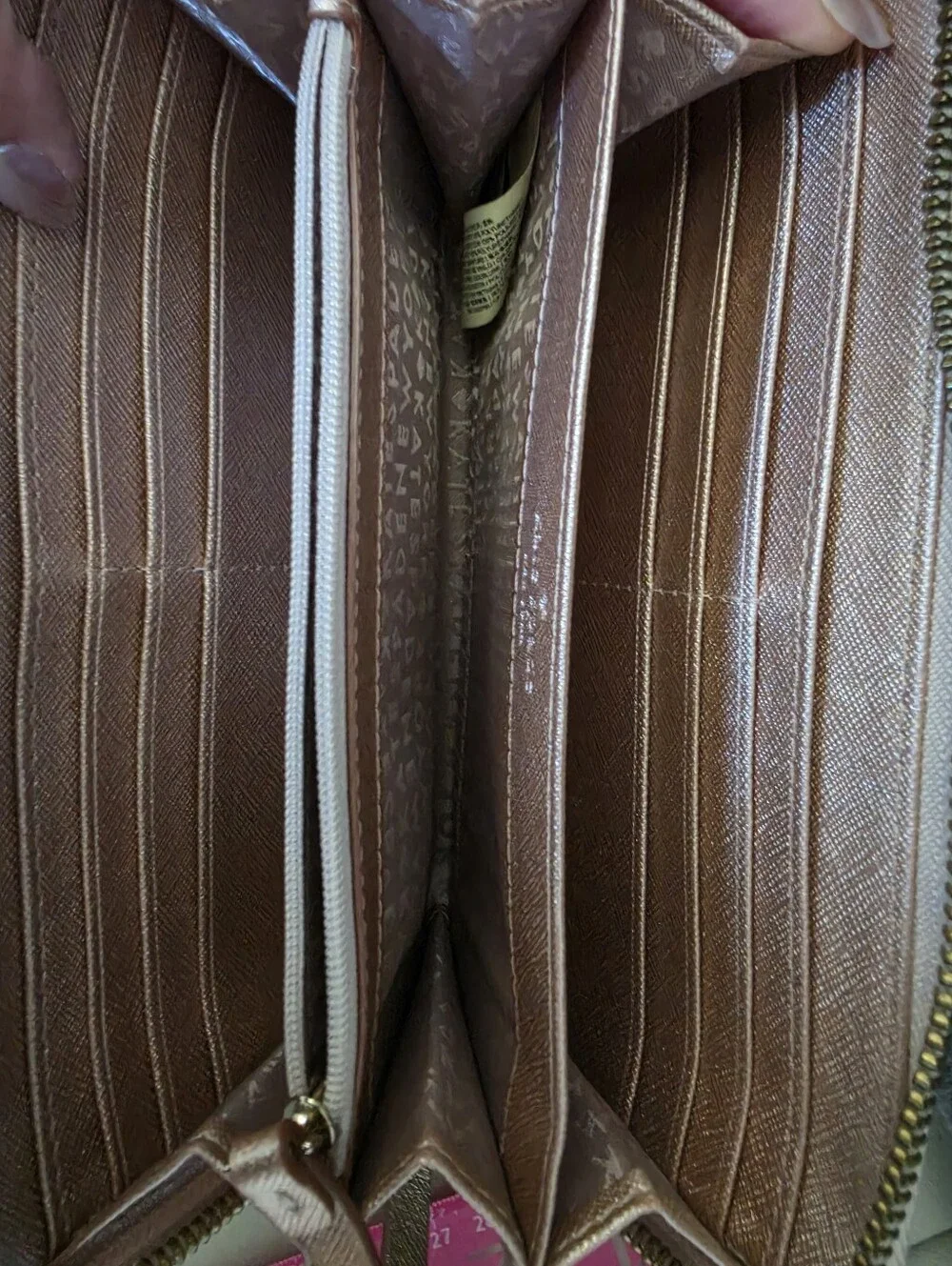 Kate Spade metallic rose wallet in rose gold